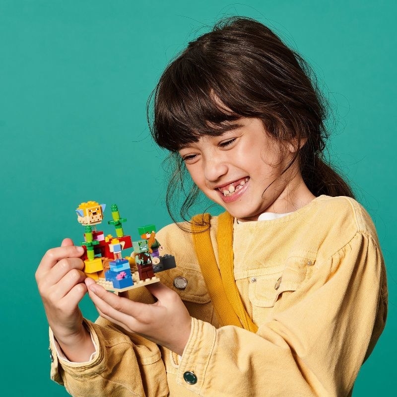 kid with minecraft lego