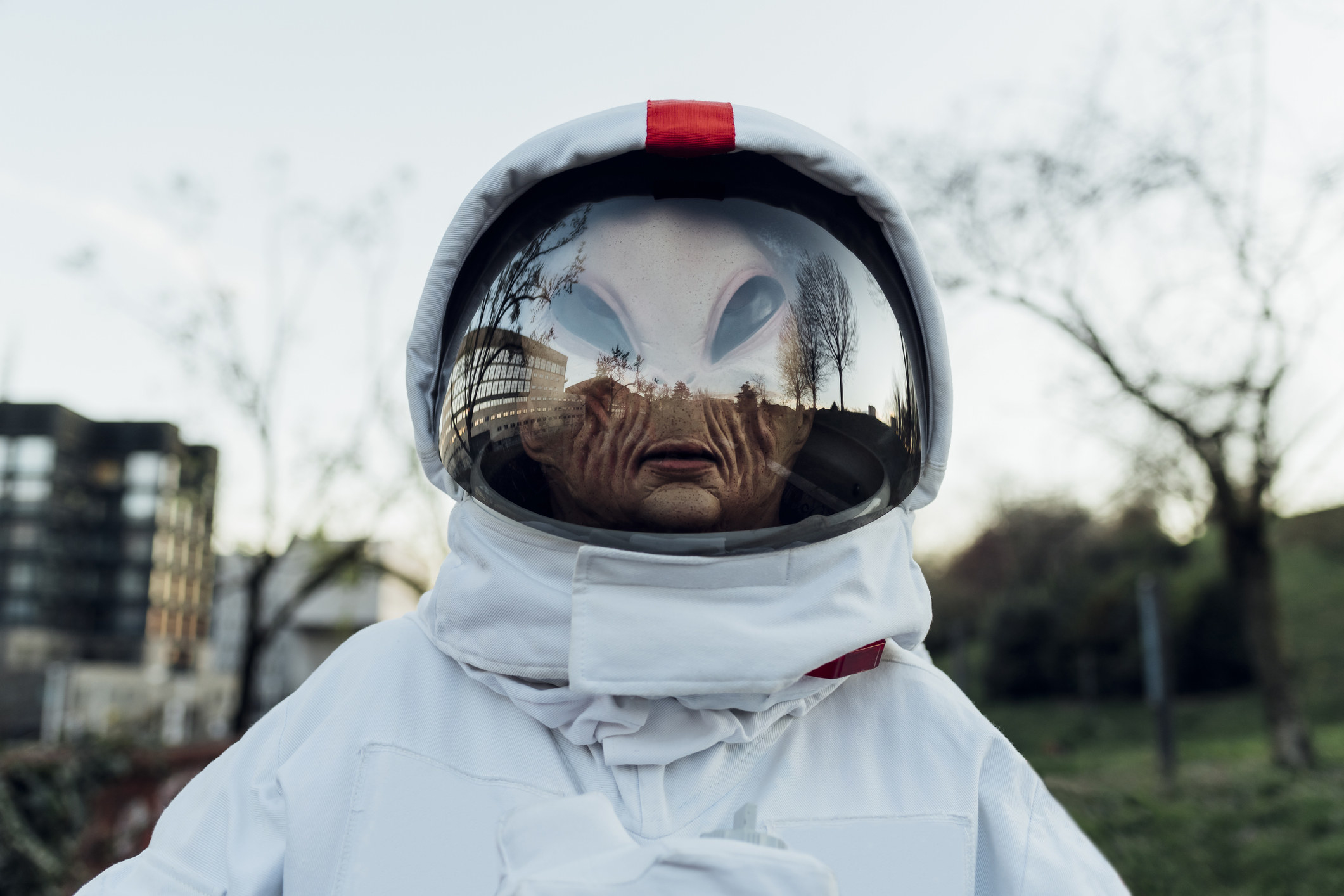An alien wearing astronaut garb