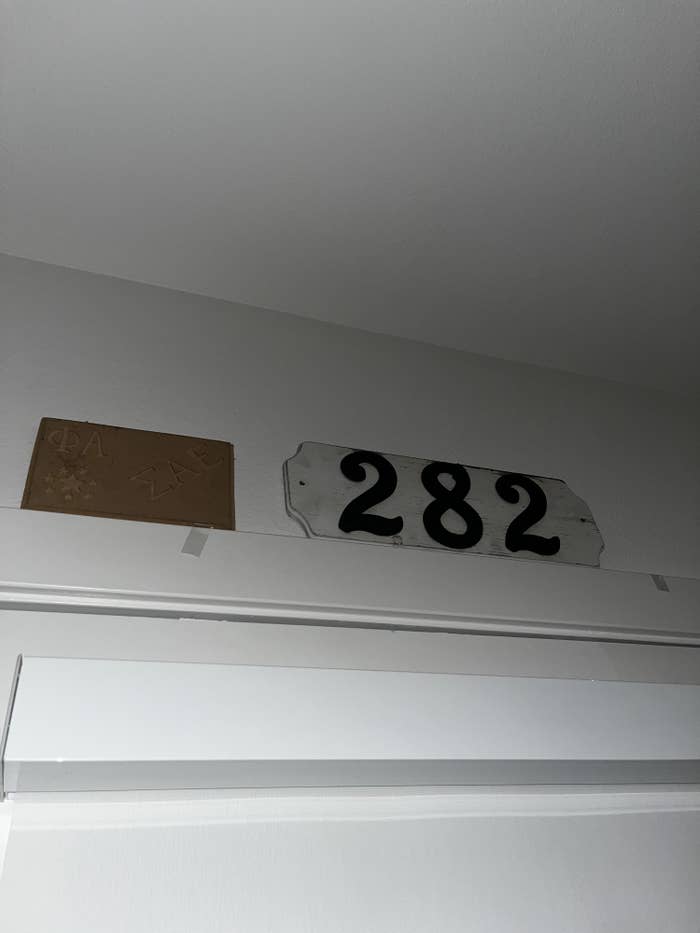 an address plate on the wall