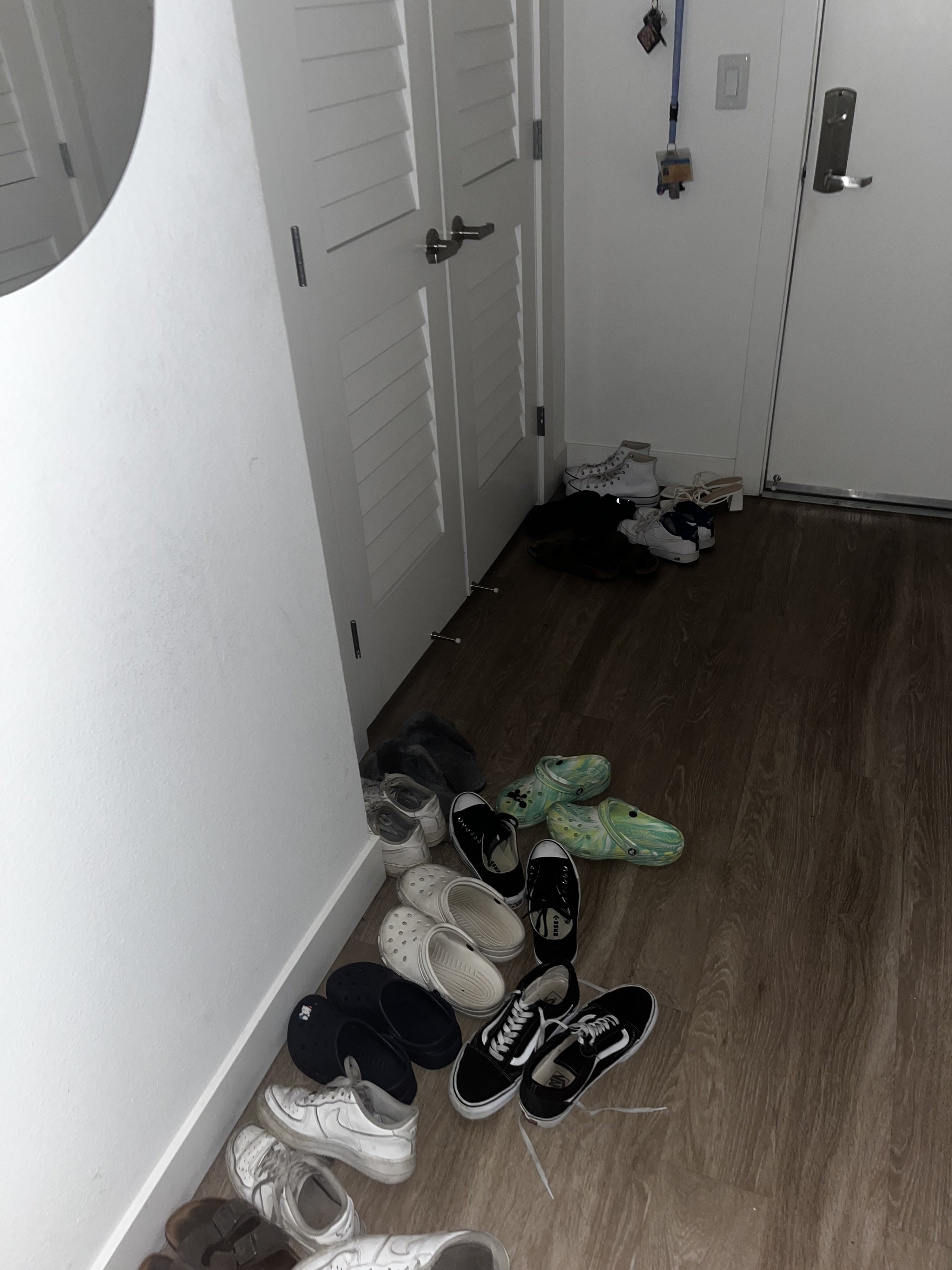 Pairs of shoes near the door