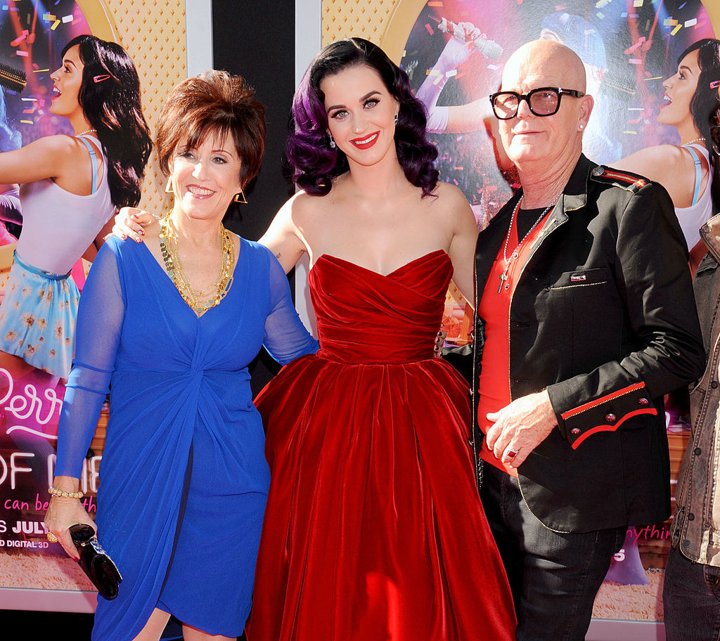 katy with her parents at an event