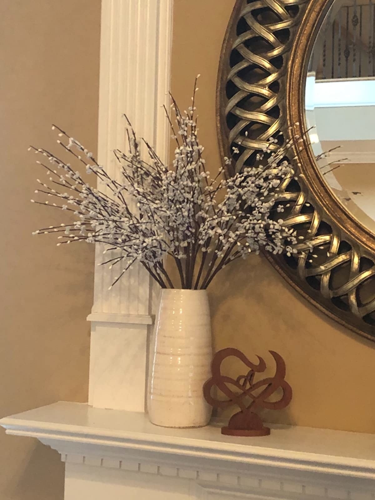 Reviewer&#x27;s photo of a vase on a mantle