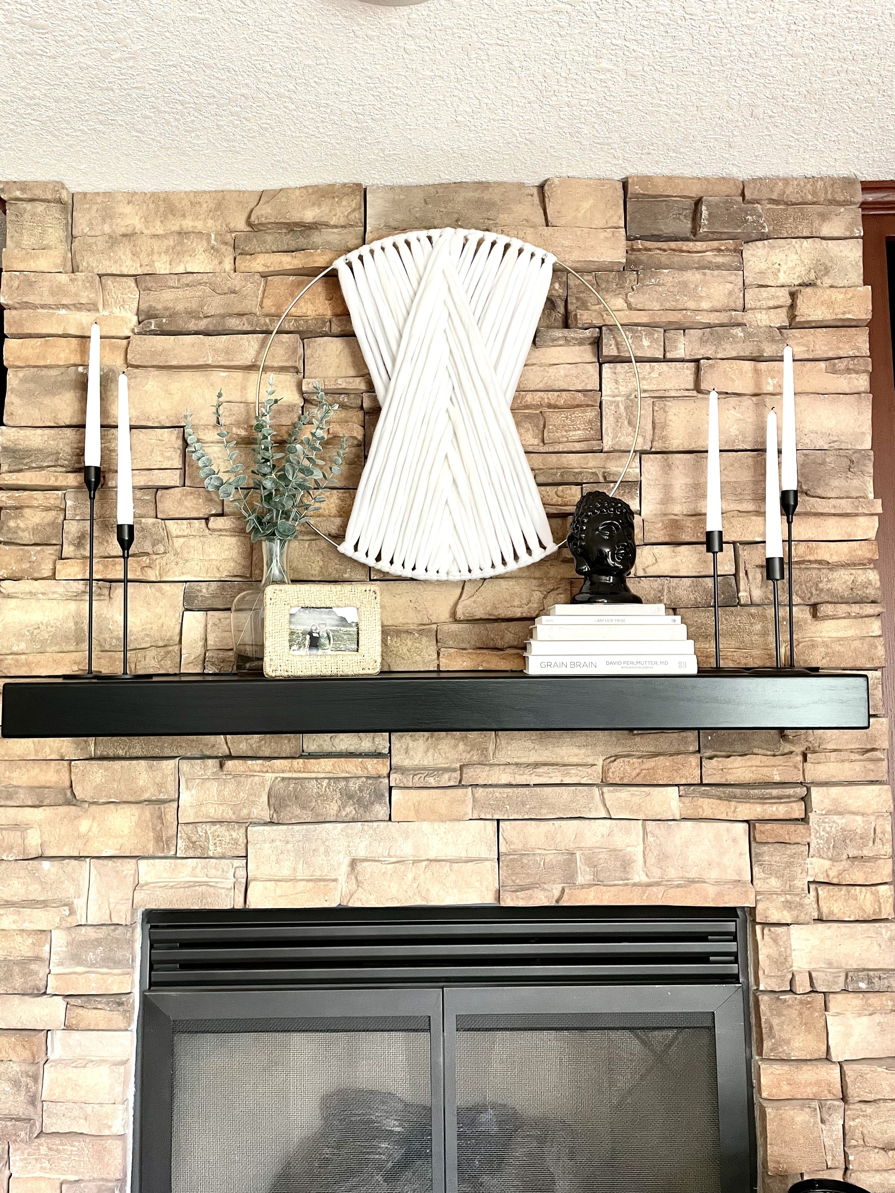 Reviewer photo of candlesticks on a mantle