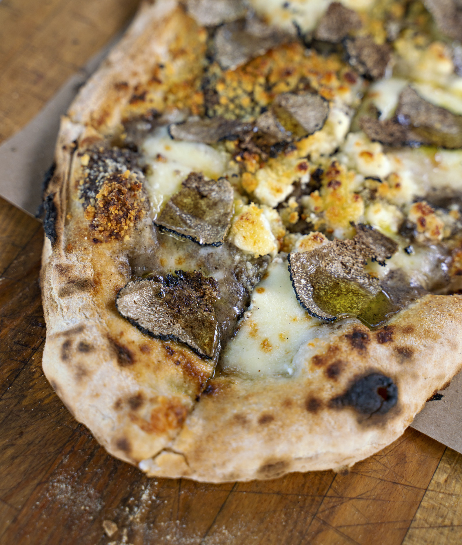 Pizza with cheese and truffles.