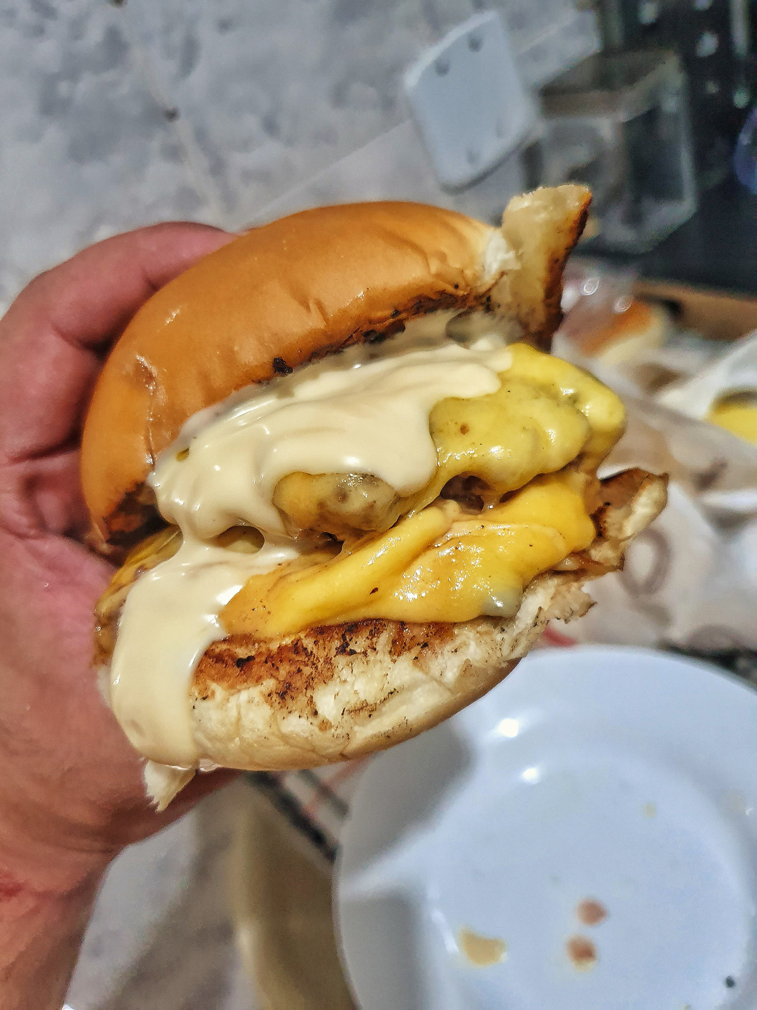 A very cheesy smash burger.