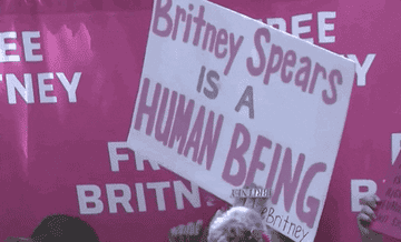 sign that says &quot;britney spears is a human being&quot;