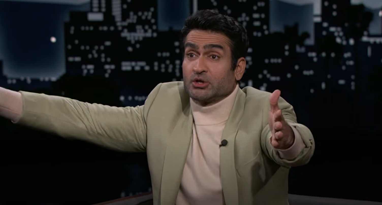 Kumail with his arms outstretched on the show
