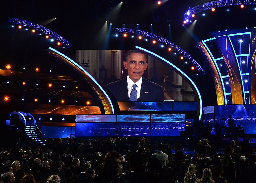 Barack on the screen at the side of the grammy stage