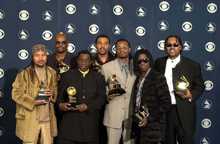 the group posing with their award