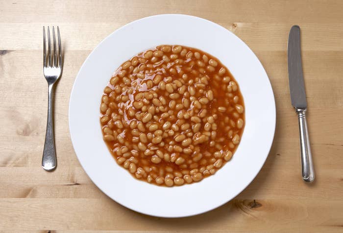 An overhead shot of baked beans in a bowl