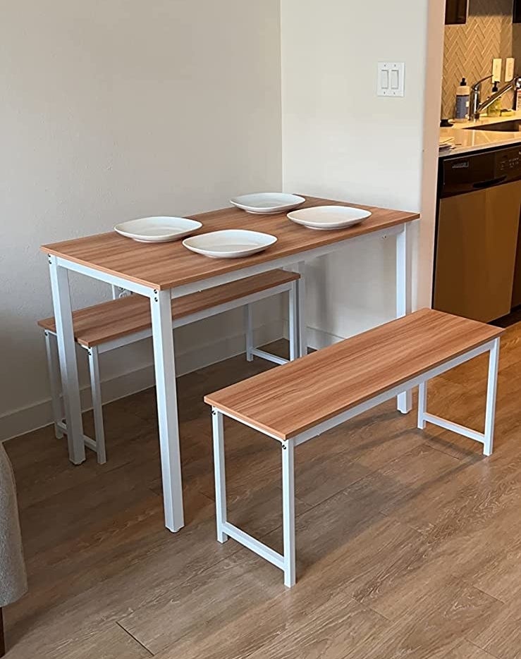 reviewer&#x27;s table with white legs and wood top