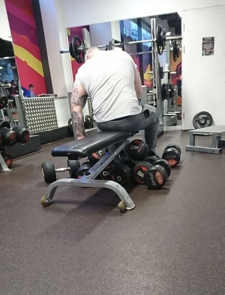 A guy working out at the gym