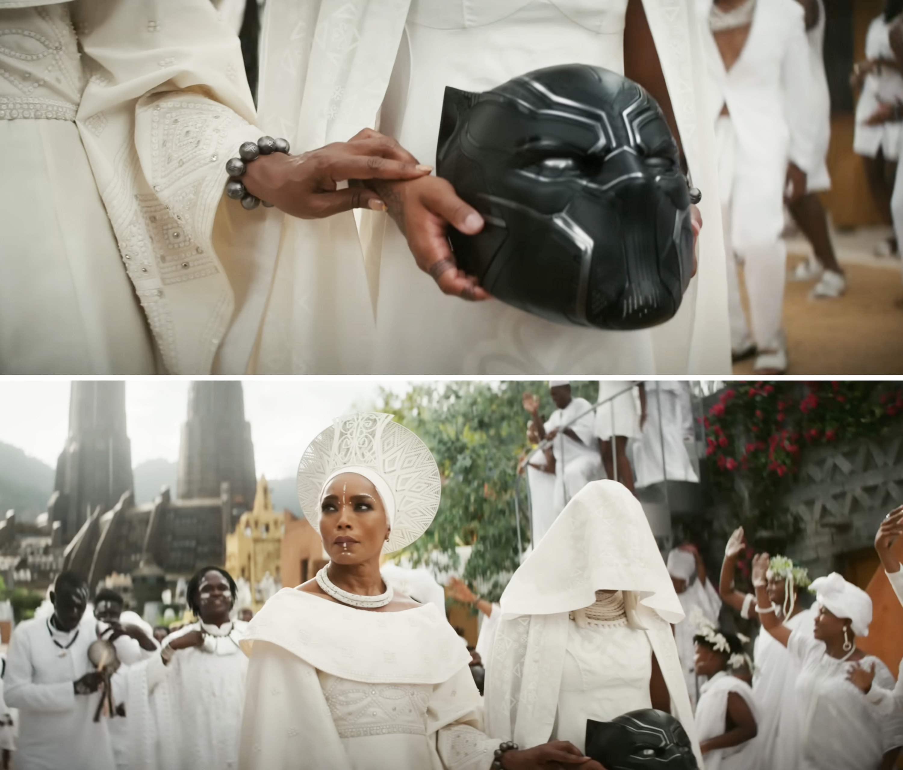 Queen Ramonda walks with the funeral procession for T&#x27;Challa alongside her daughter Shuri who&#x27;s holding the Black Panther mask