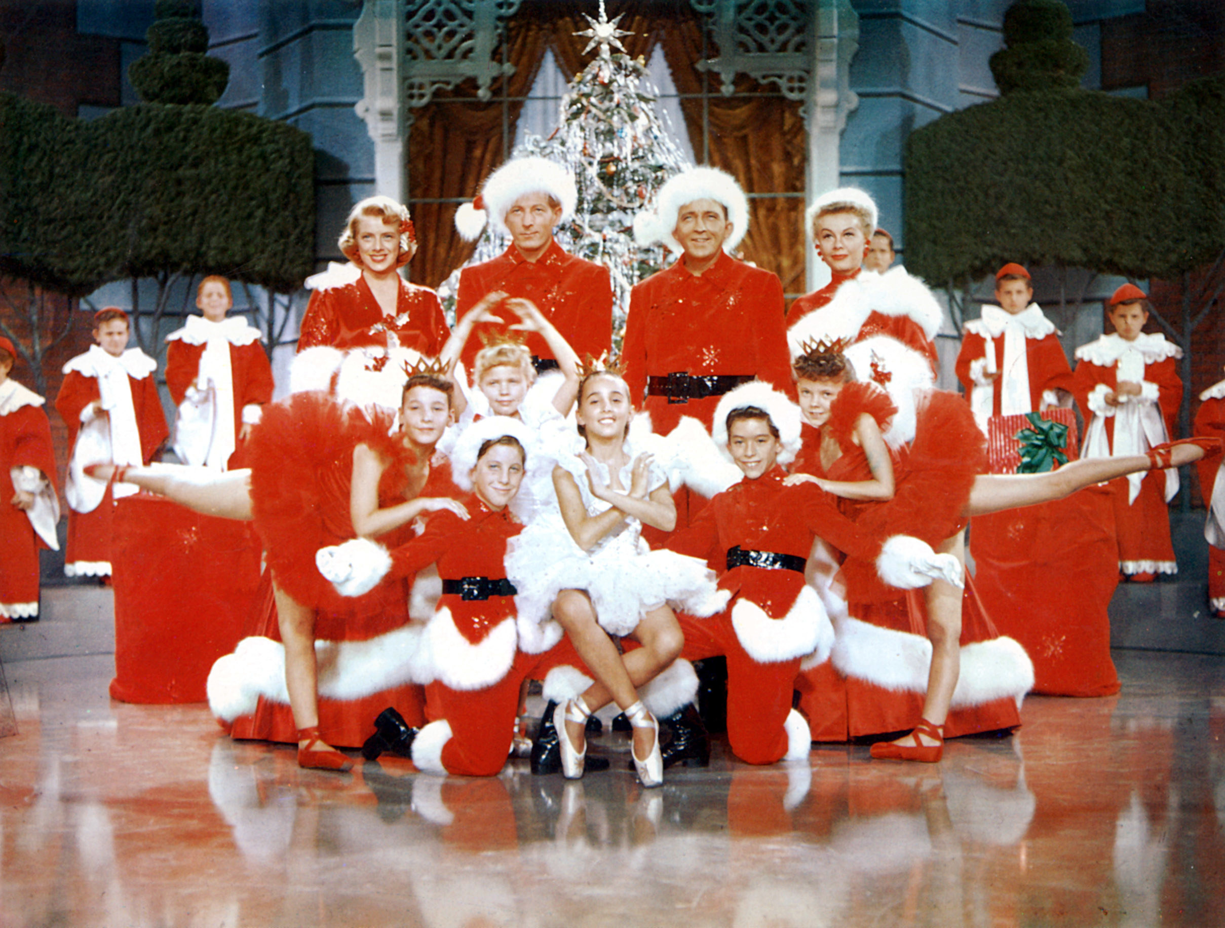 A group of performers dressed as Santa
