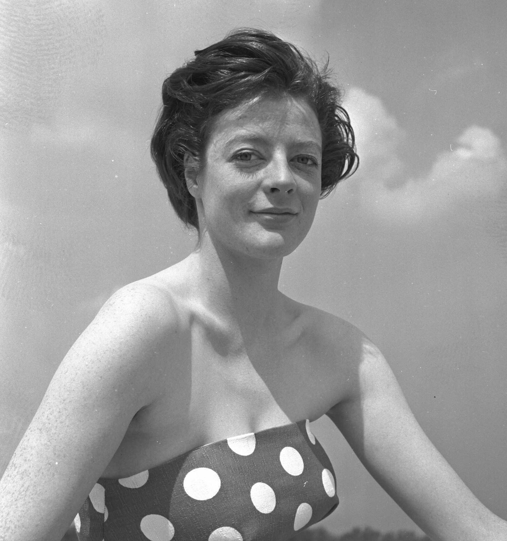 young Maggie Smith in a bathing suit