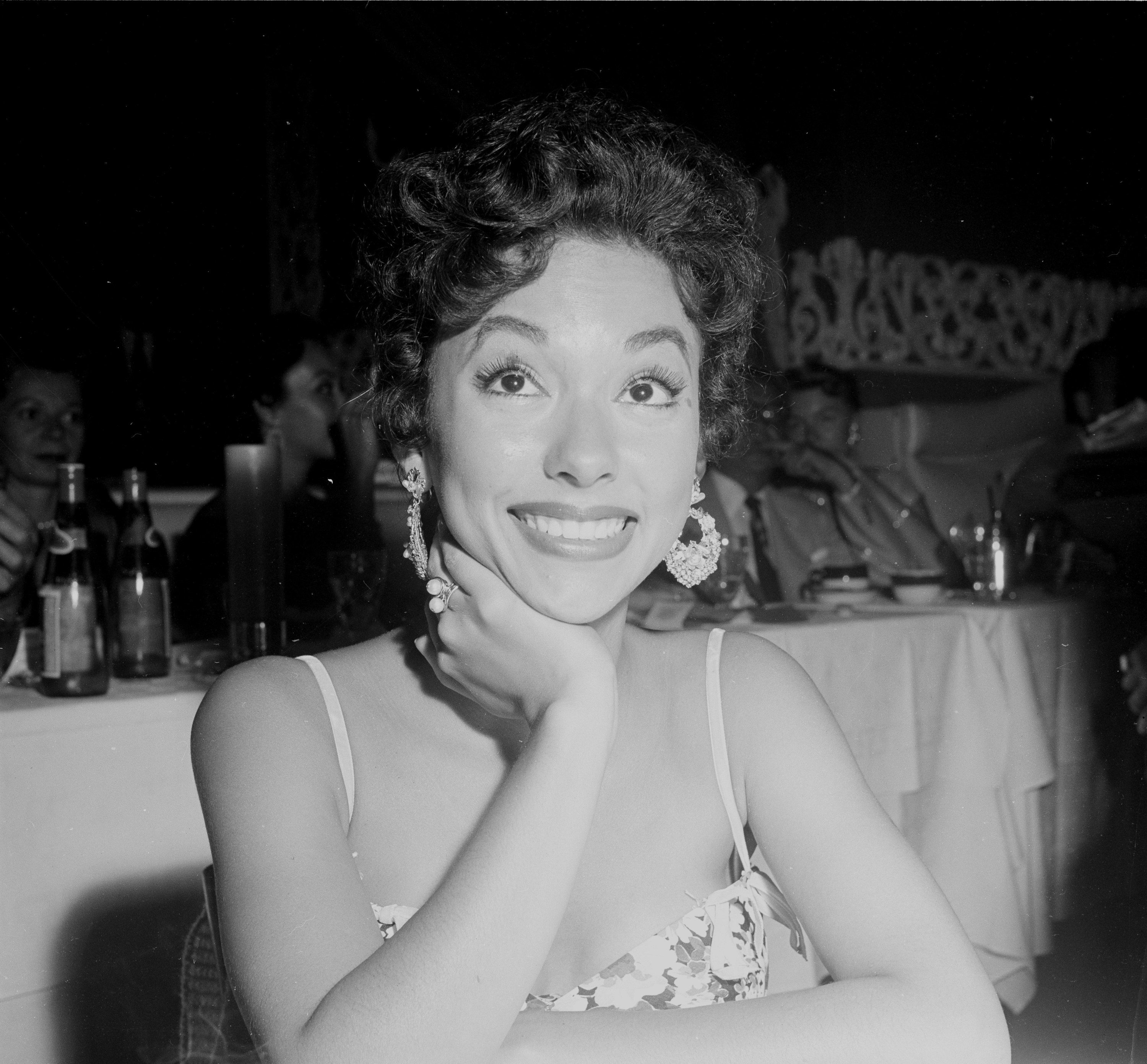 closeup of a young Rita Moreno smiling