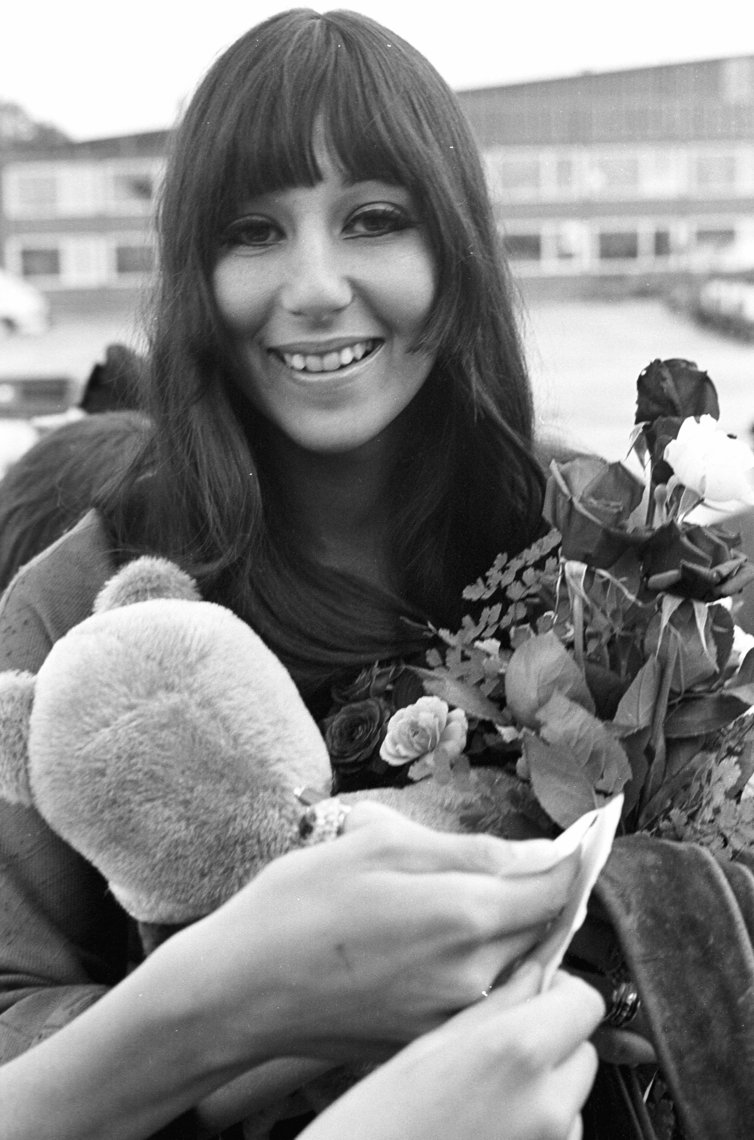 a young Cher smiling