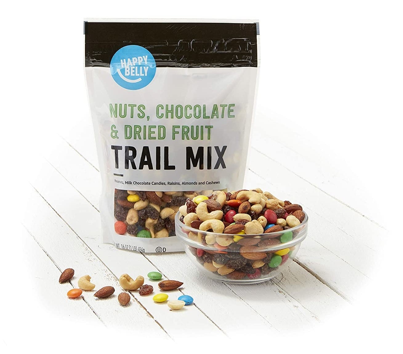 bag of trail mix next to a bowl filled with the trail mix