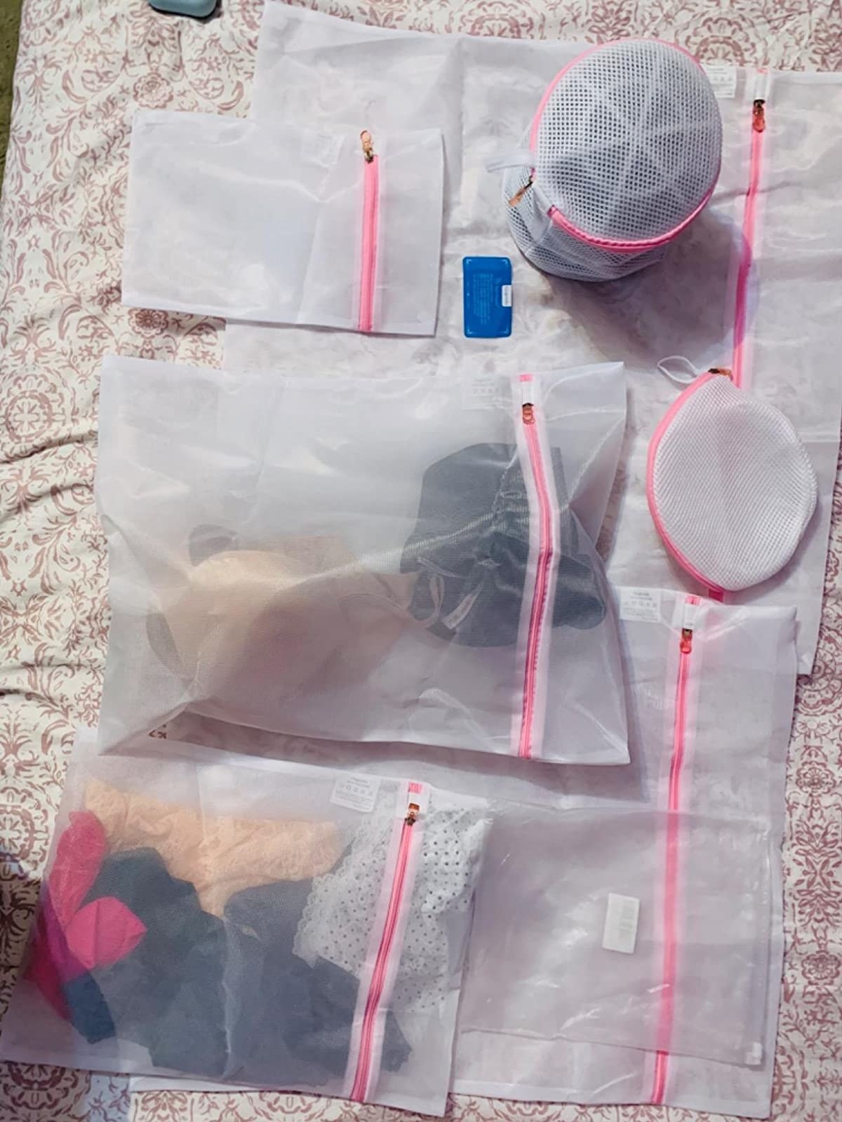 Reviewer image of mesh bags filled with laundry items