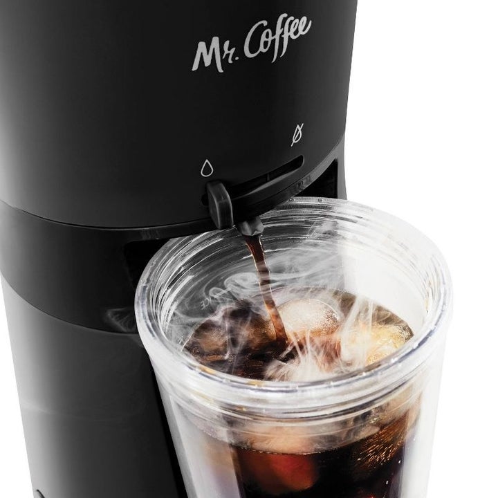 Mr. Coffee brewing into plastic tumbler of iced coffee