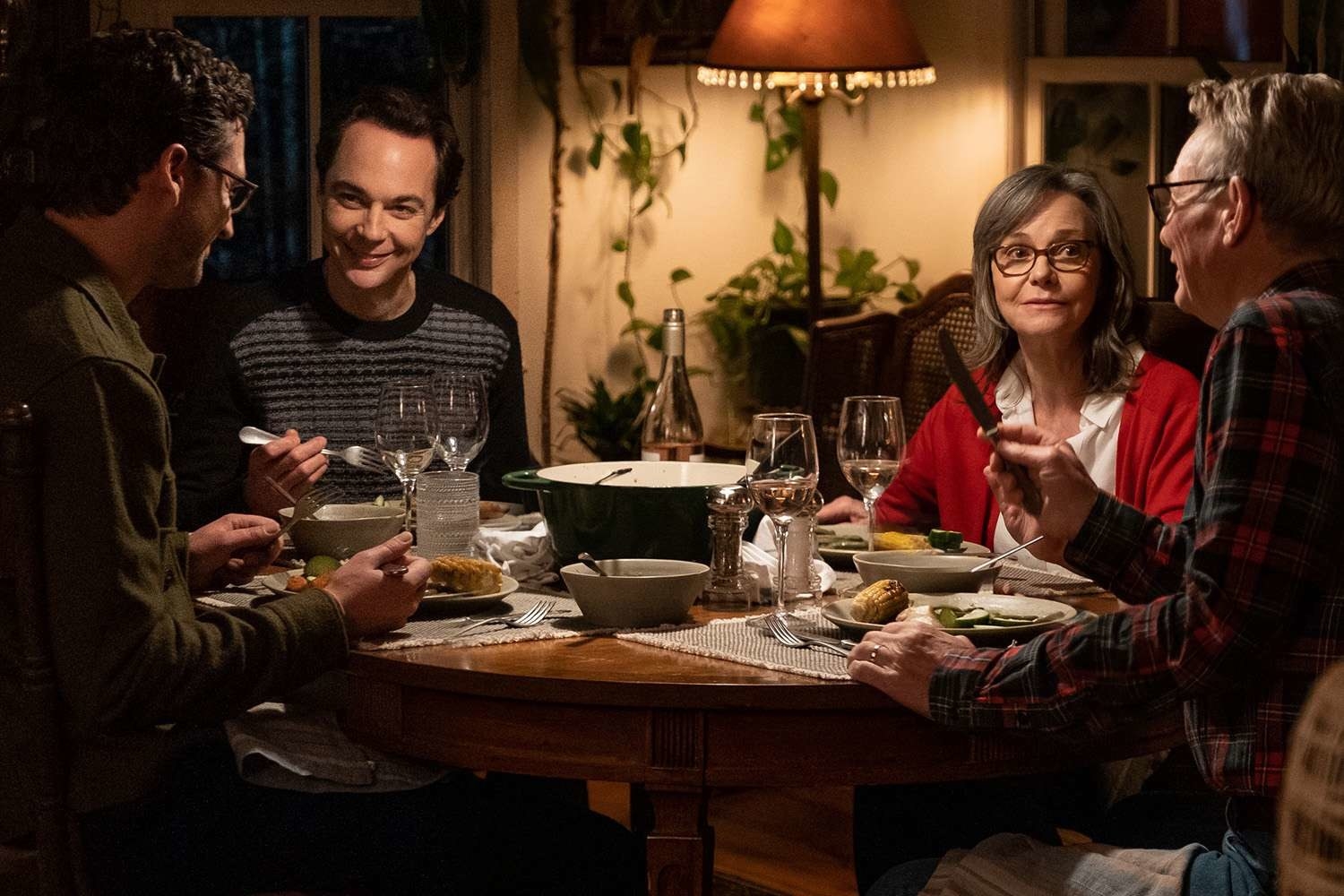 Ben Aldridge, Jim Parsons, Sally Field, and Bill Irwin sit at the dinner table in &quot;Spoiler Alert&quot;