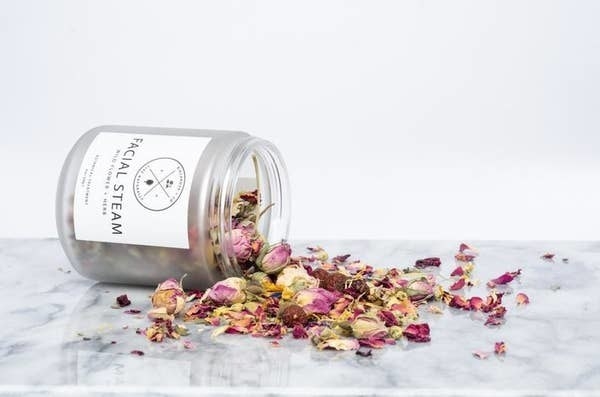 The jar of dried flower mix tipped over to show the contents