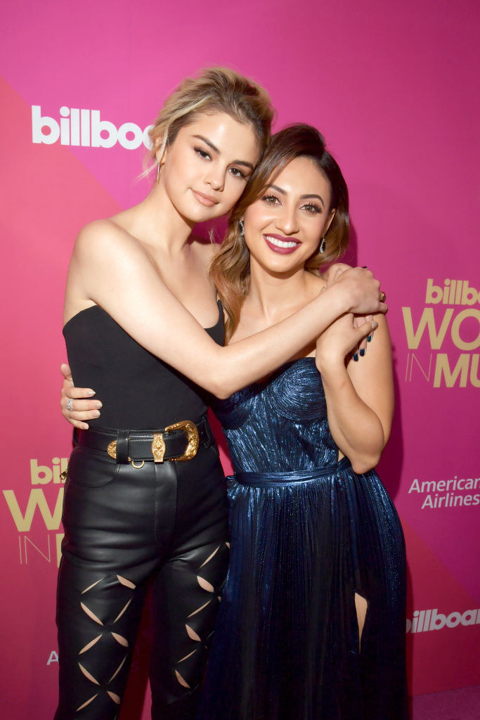 the two hugging at an event