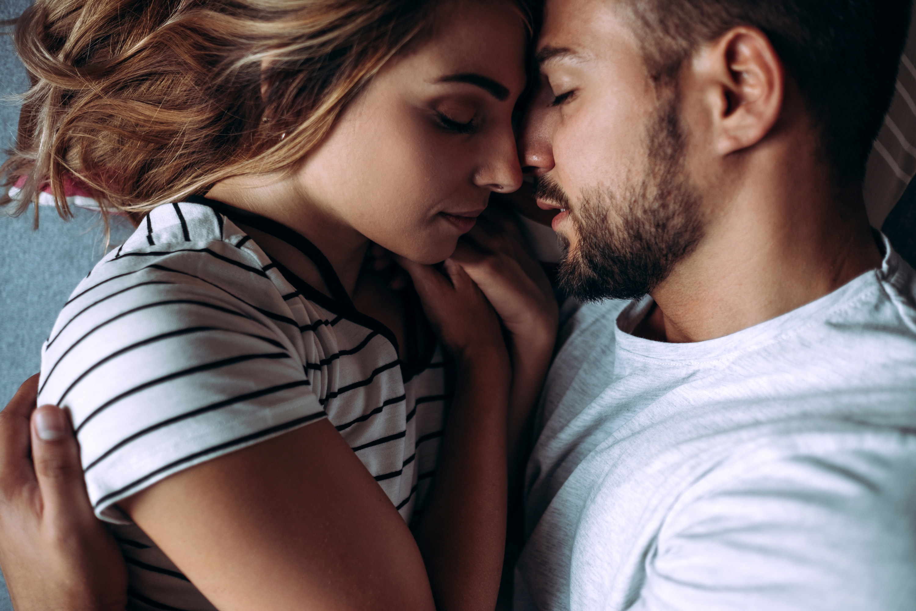 a couple touching foreheads