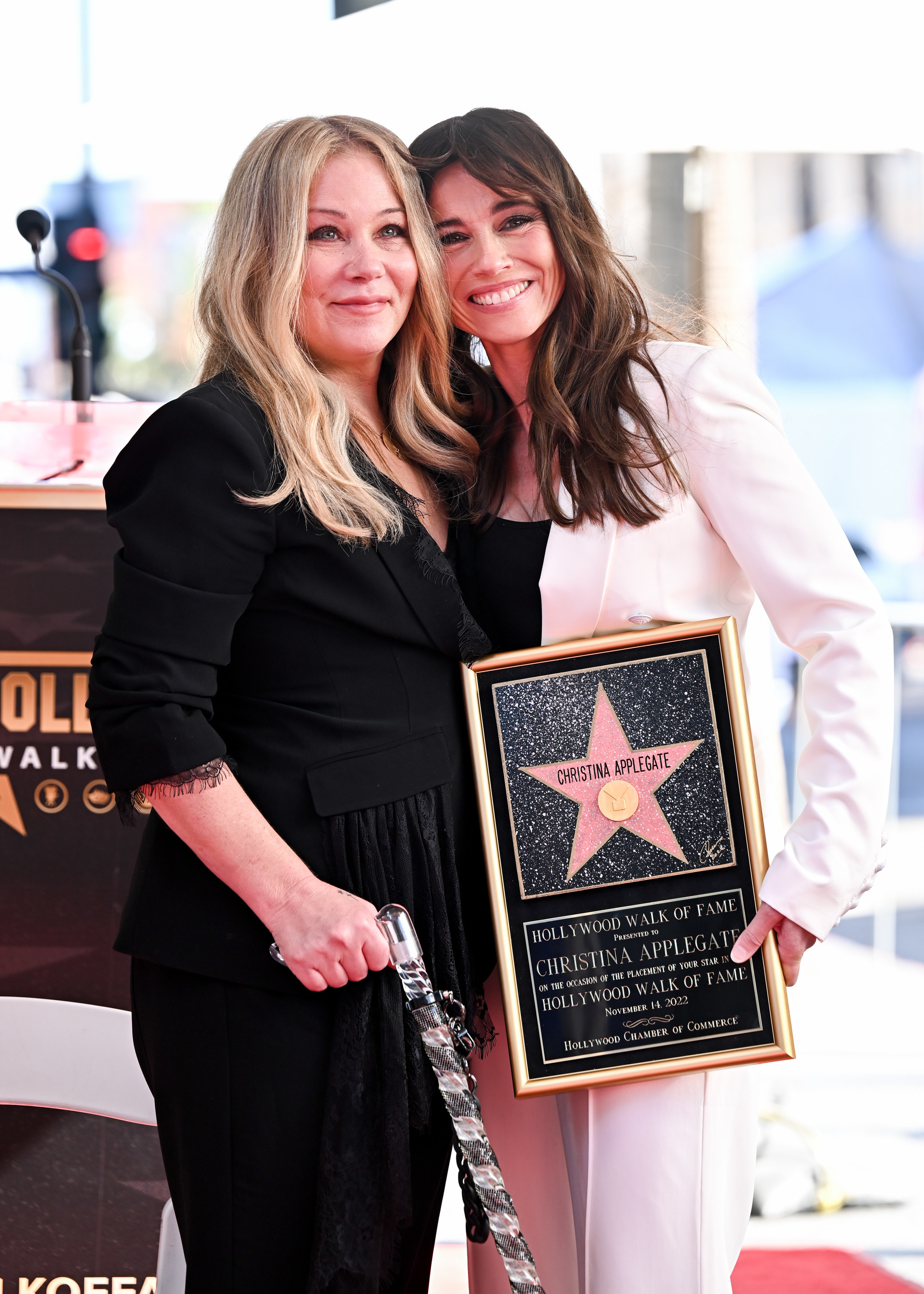 Linda and Christina smile as they stand together at Christina&#x27;s Hollywood Walk of Fame ceremony