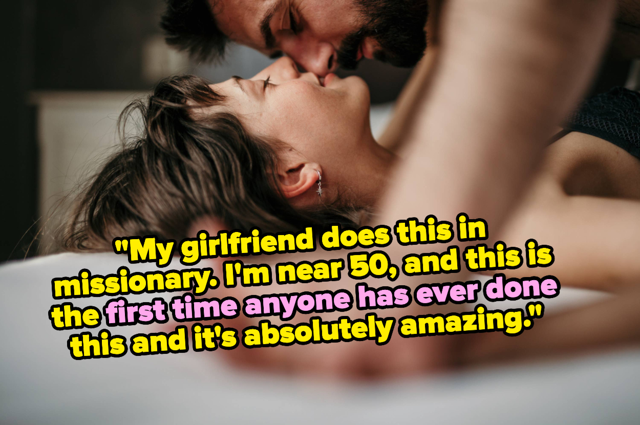 a couple kissing in bed together 