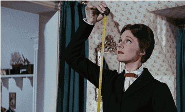gif of mary poppins measuring her height. the tape says practically perfect in every way.