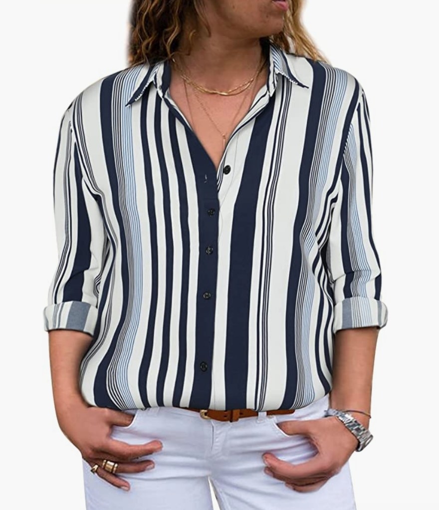 A model wearing a blue and white striped button up