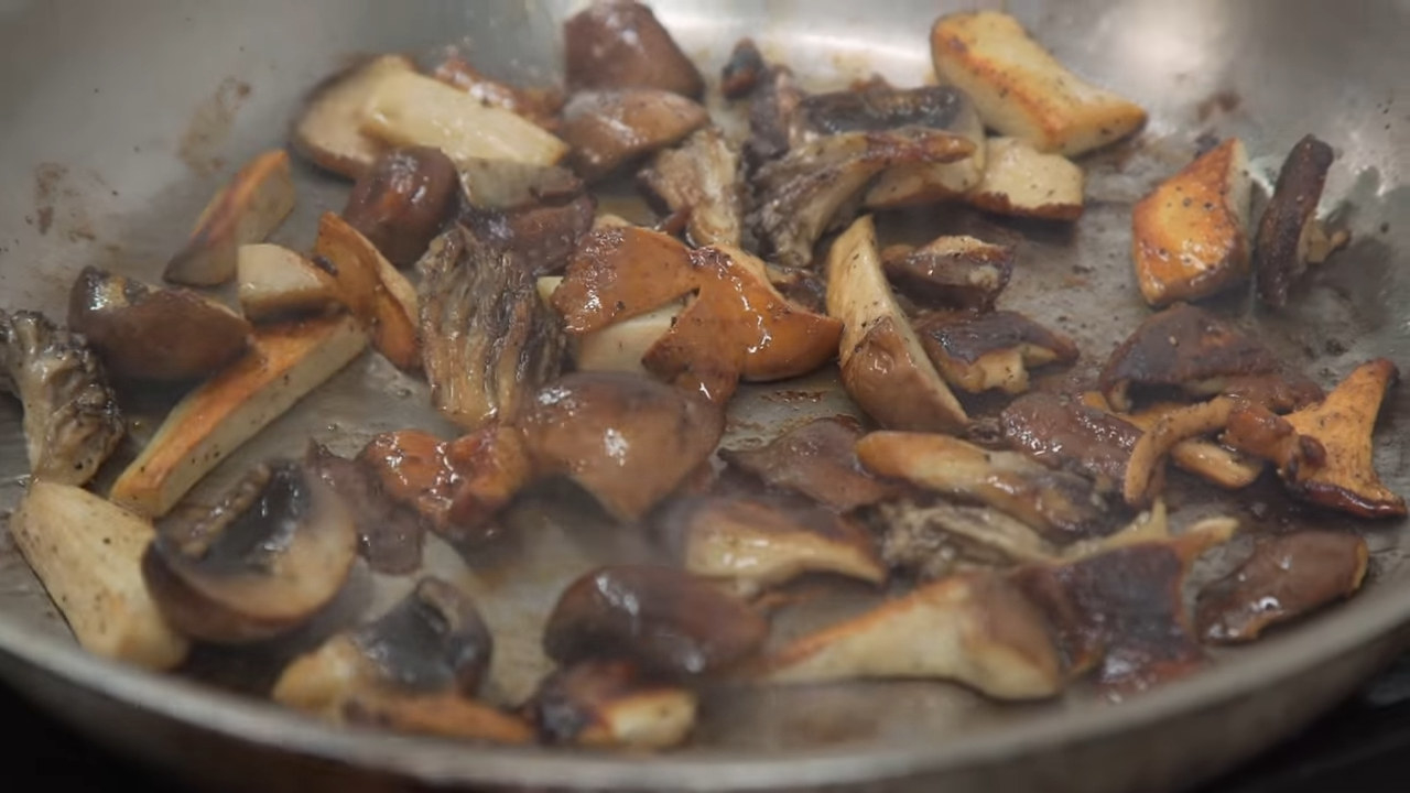 browning mushrooms in a pan