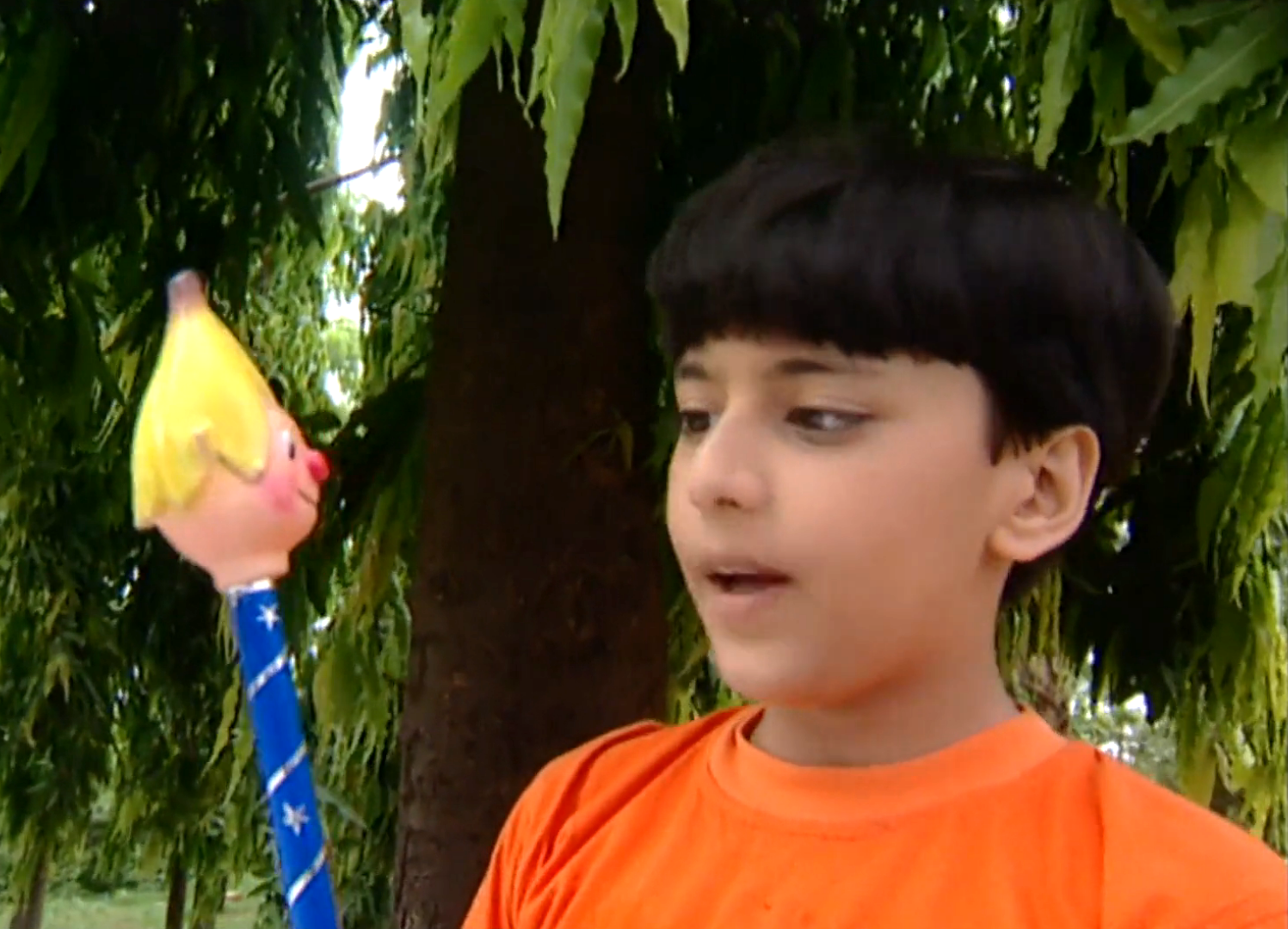 Kinshuk Vaidya holding a large pencil