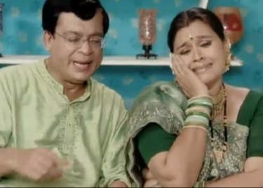 Rajeev Mehta and Supriya Pathak sitting next to each other