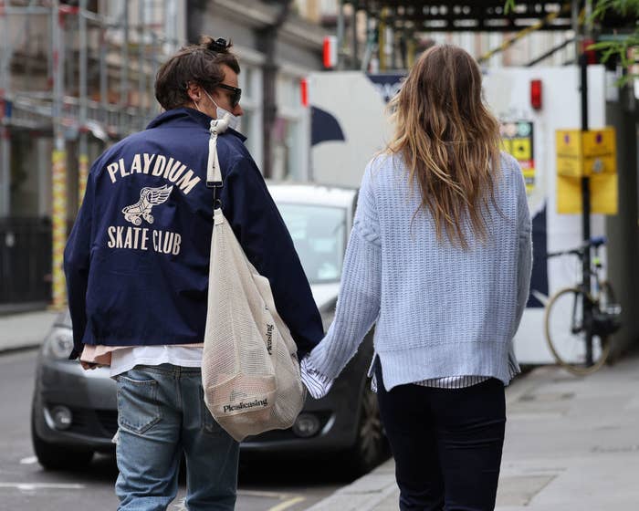 the two walking down the street