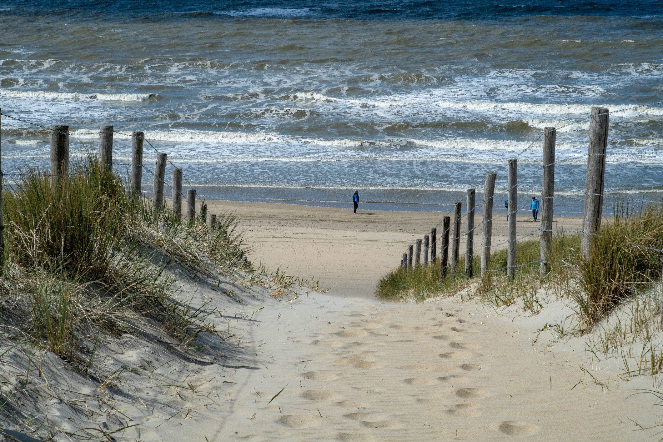 zandvoort beach as seen from a sandy path leading down to the sea