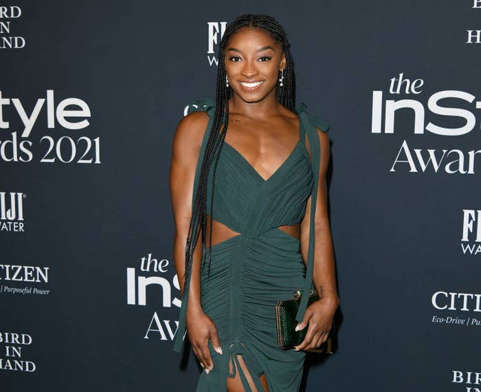 Simone smiles while posing for photographers on the red carpet of the 2021 InStyle Awards