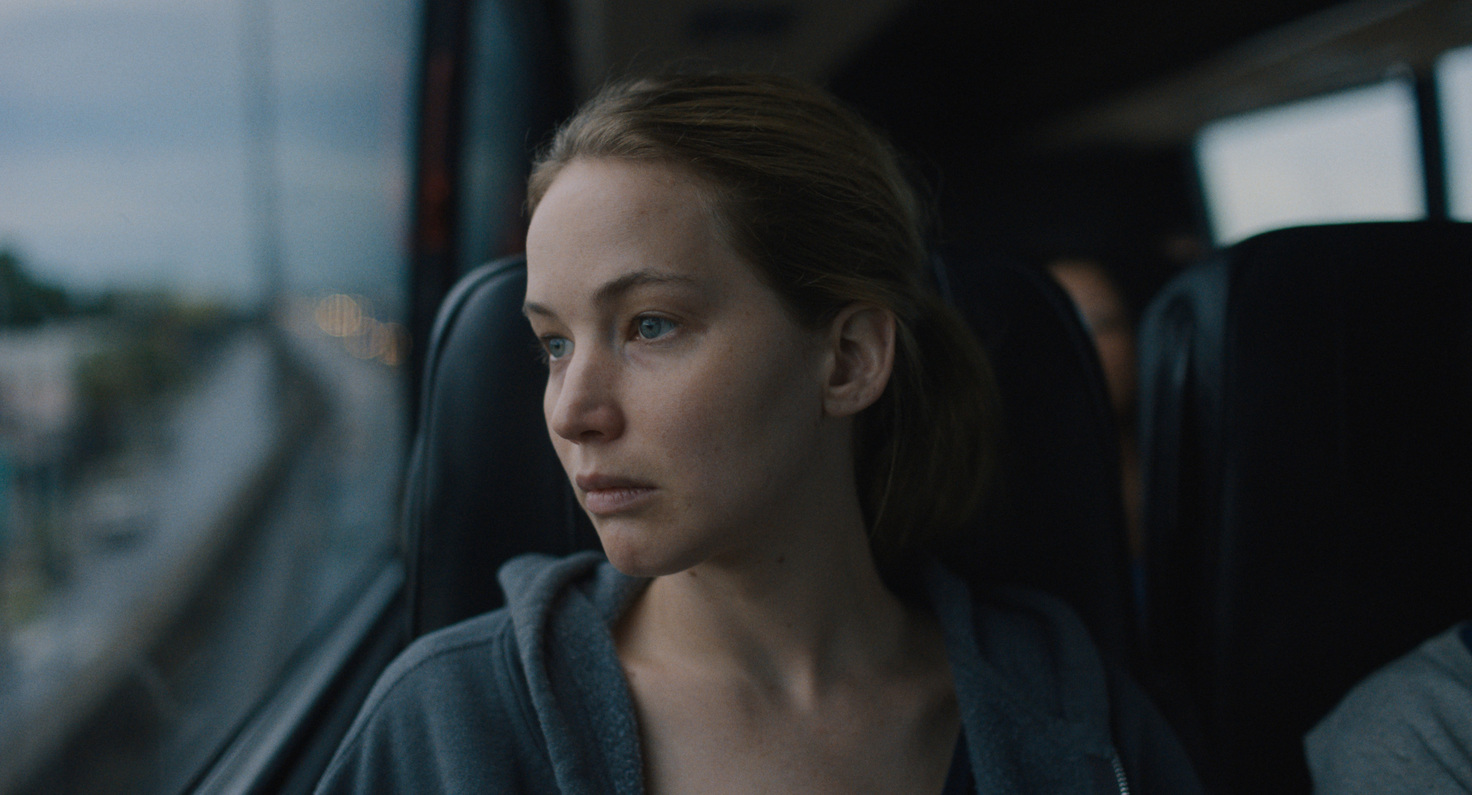 Jennifer Lawrence rides a bus