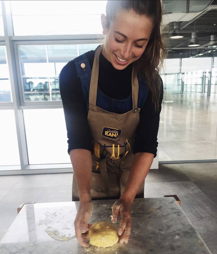 The author shaping dough on a countertop