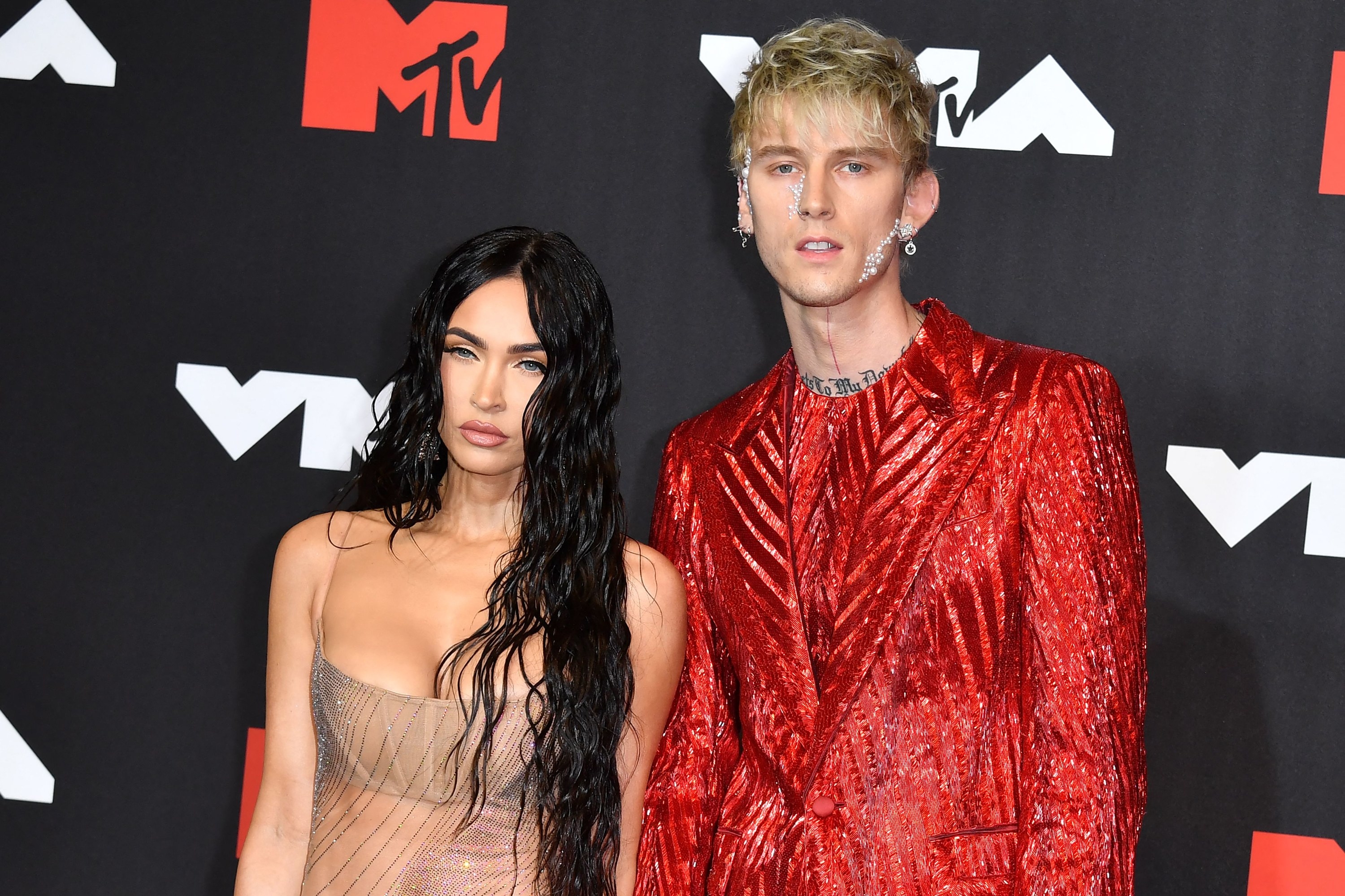 A closeup of Megan and MGK