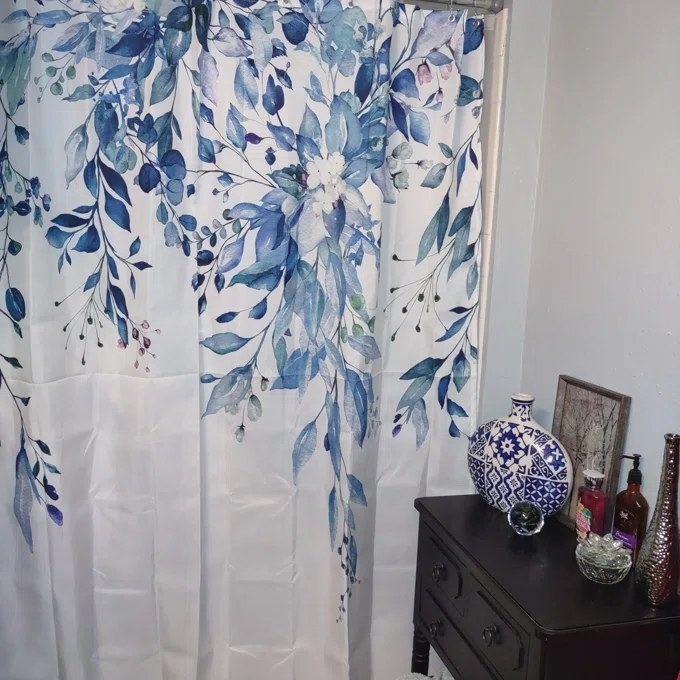 Reviewer&#x27;s photo of the shower curtain in the color White/Blue