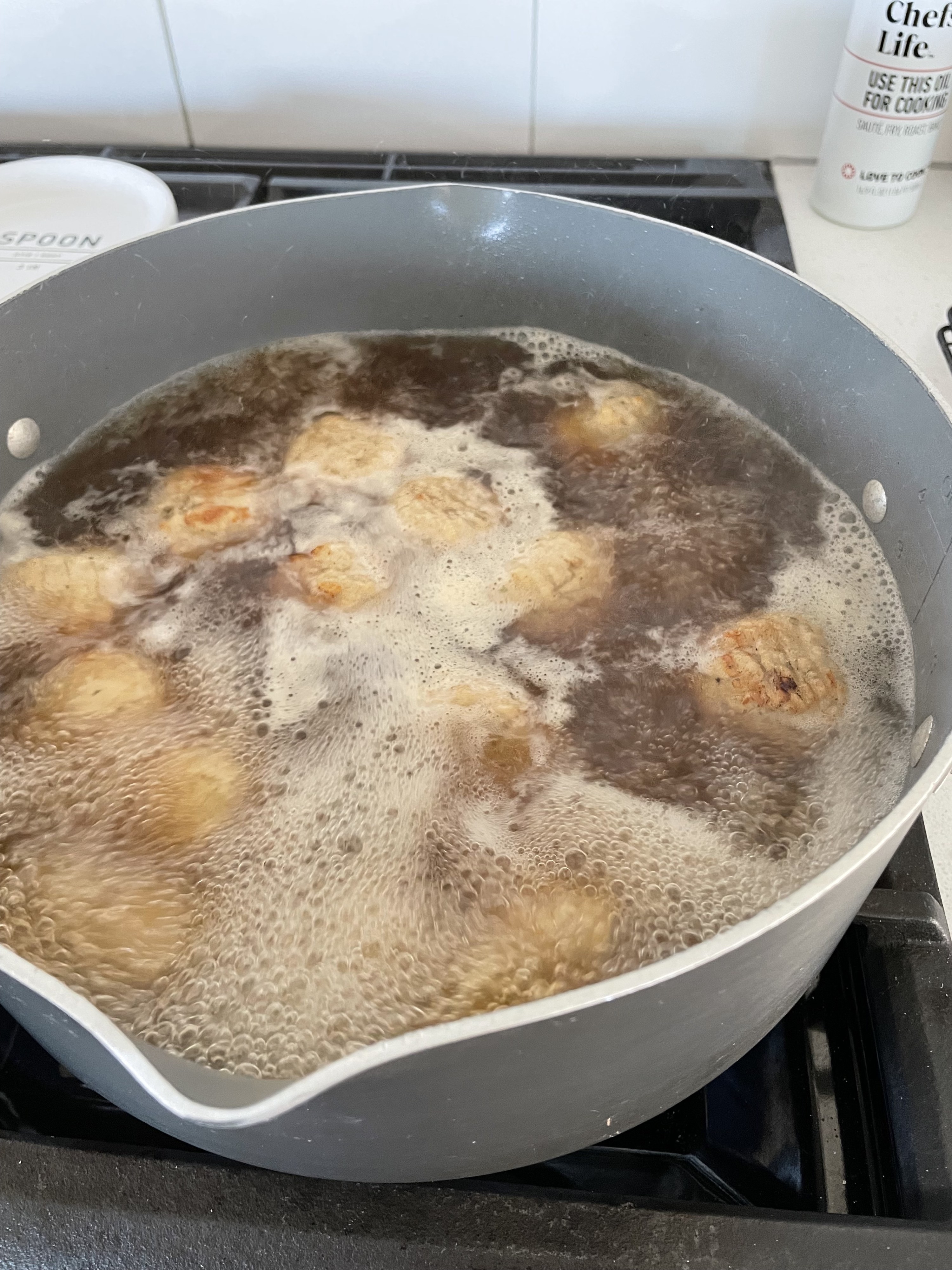 meatballs cooking in a pot