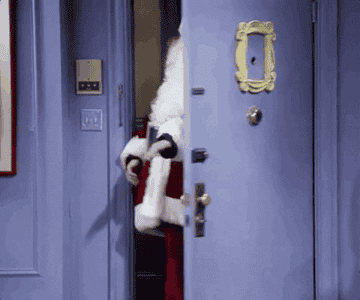 Chandler from Friends, dressed up as Santa Claus
