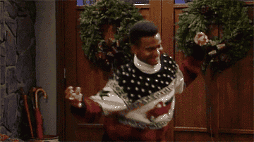 Carlton doing his dance in a Christmas sweater