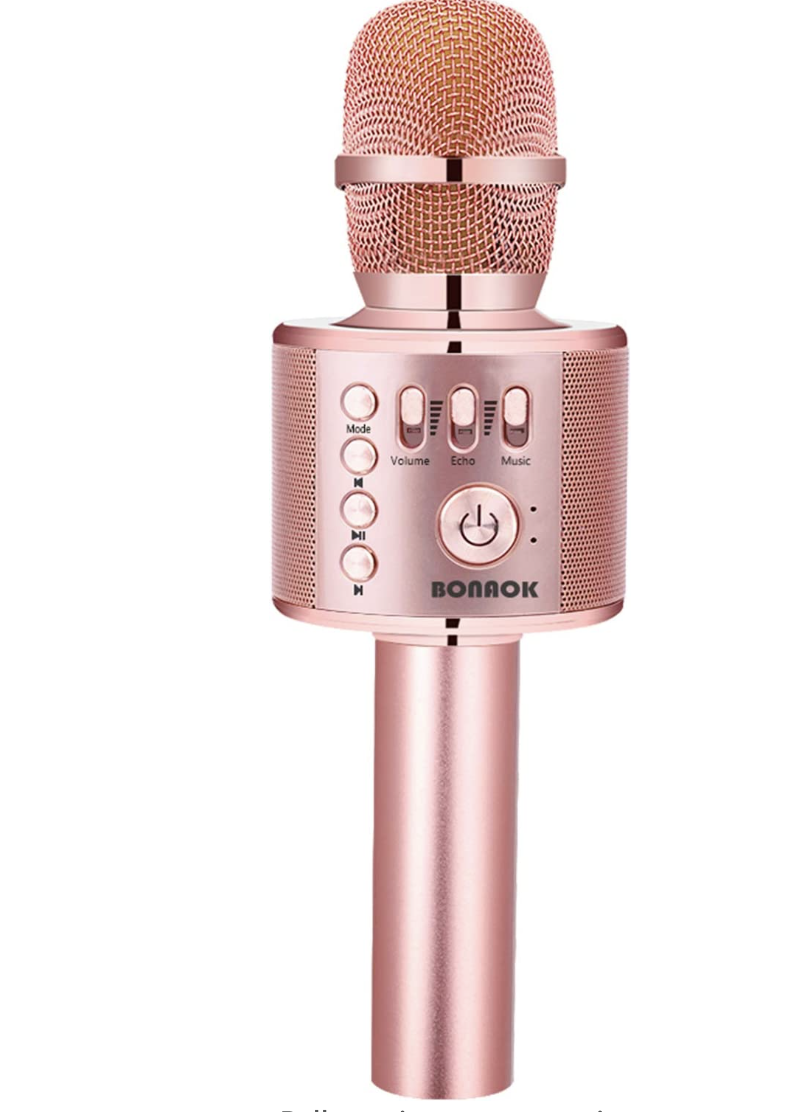 the microphone in front of a plain background
