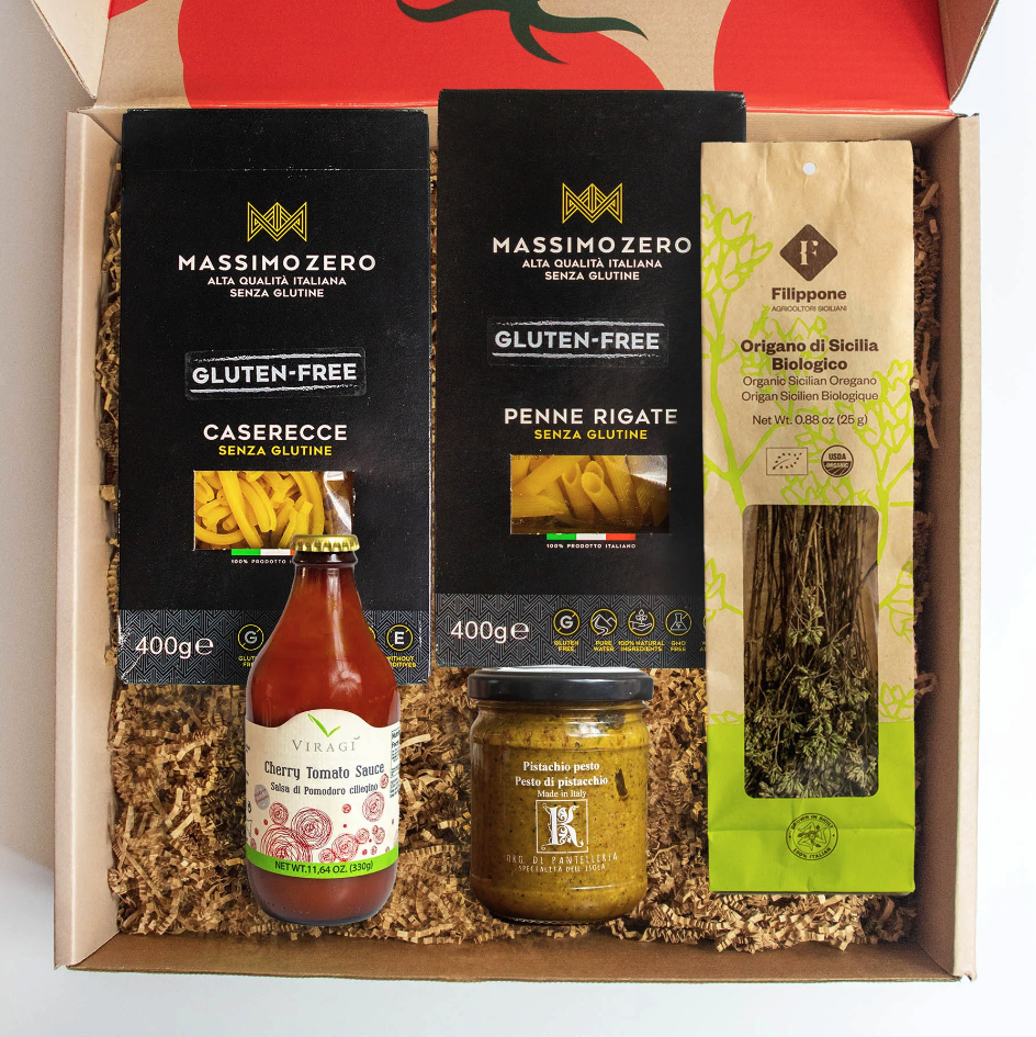 Box with gluten-free products including pasta, sauce, and oregano.