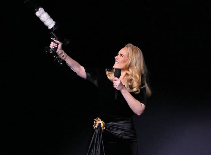 Adele using a T-shirt gun