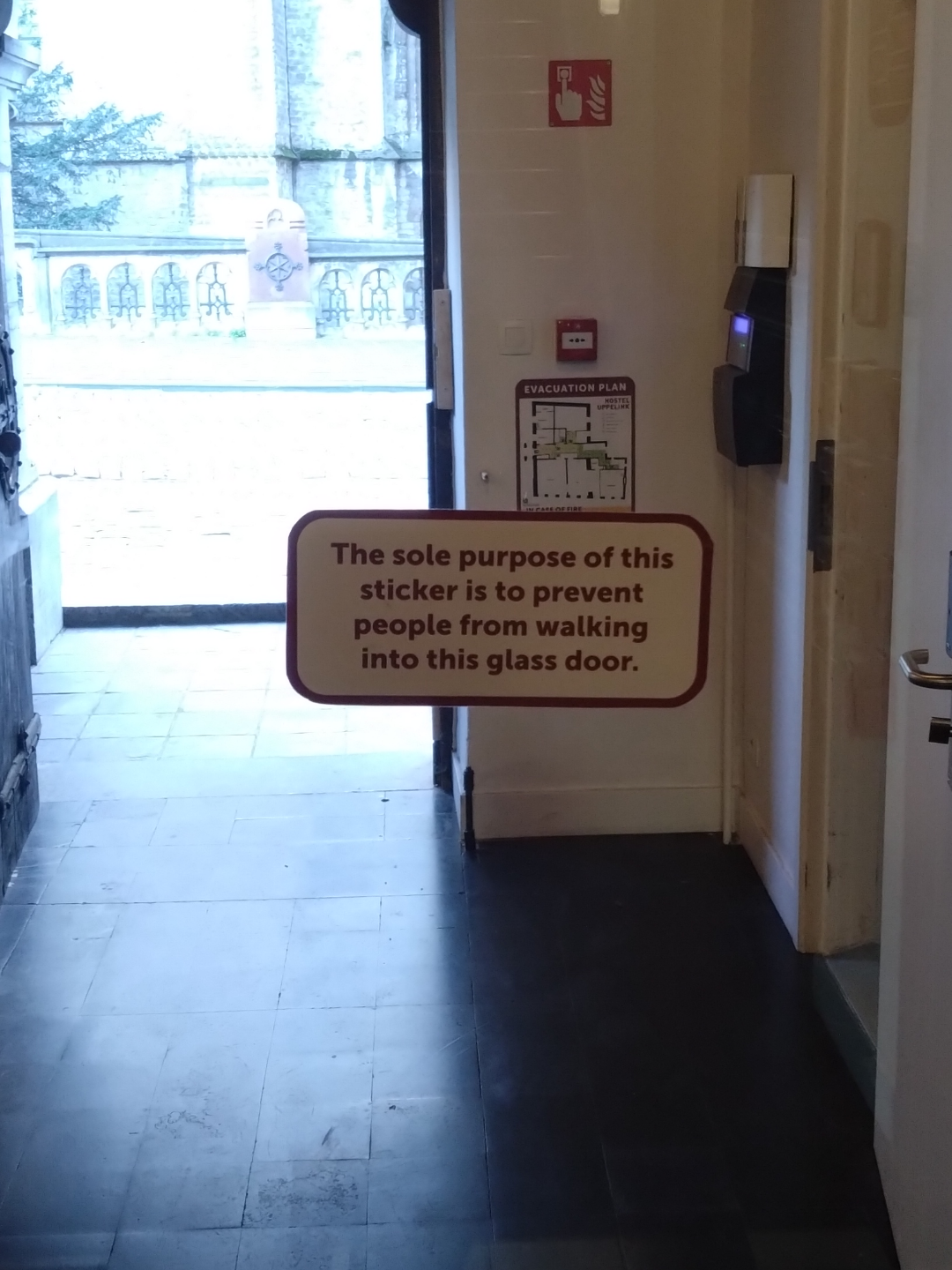 &quot;The sole purpose of this sticker is to prevent people from walking into this glass door.&quot;