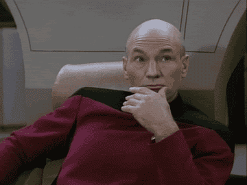 Patrick Stewart as Captain Picard putting his head in his hand in his head in &quot;The Next Generation&quot;